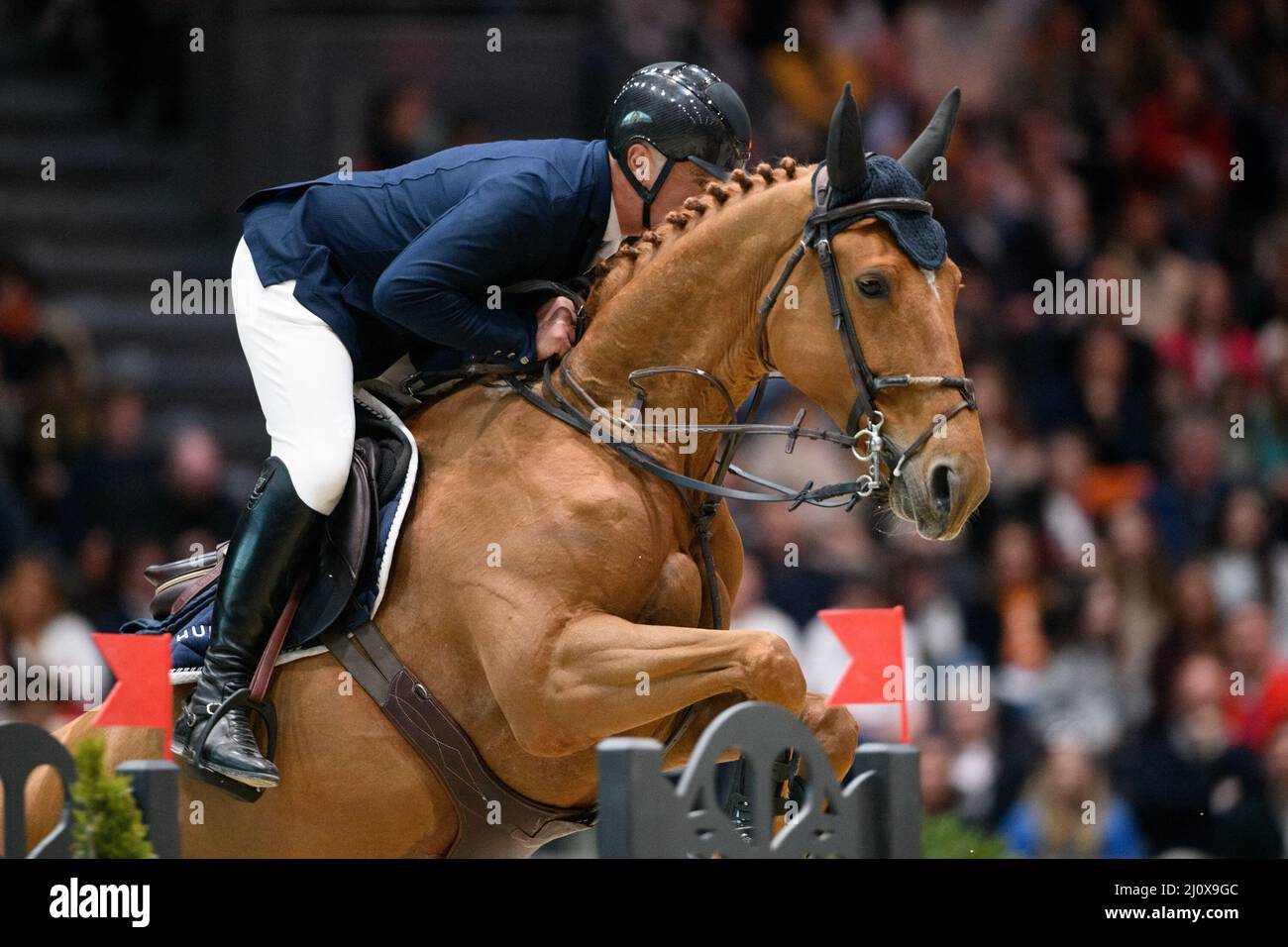 Paris, France. 20th Mar, 2022. Roger-Yves Bost and Ballerine du Vilpion  compete during the Saut Hermes at Le Grand Palais Ephemere on March 20, 2022  in Paris, France. Photo Laurent Zabulon/ABACAPRESS.COM Credit: