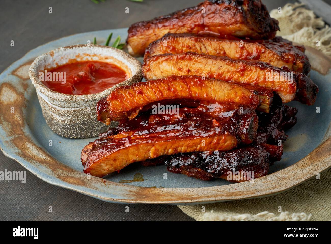 Keto food, spicy barbecue pork ribs. Slow cooking recipe. Pickled