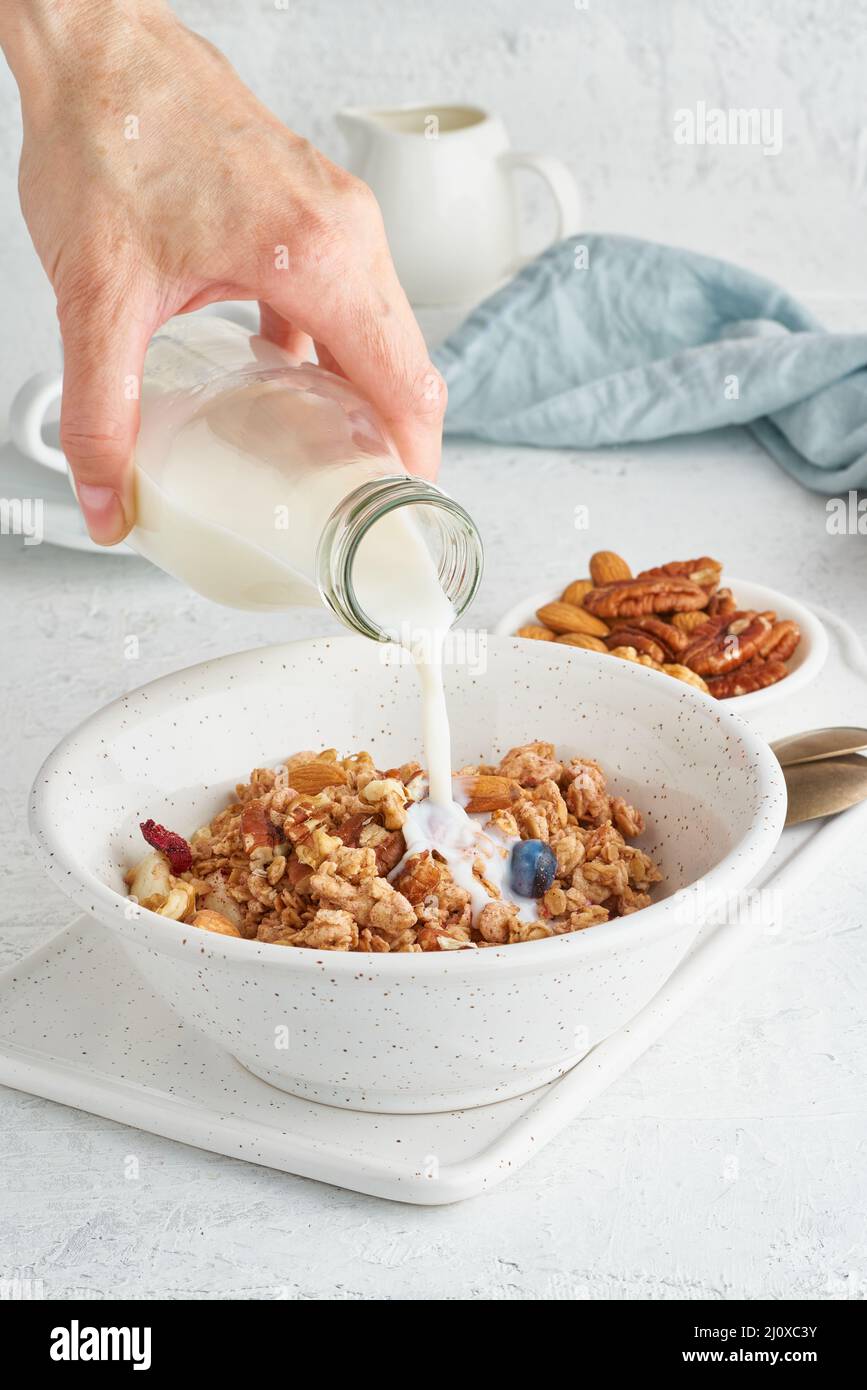 Granola. Breakfast, healthy diet food with oat flakes, nuts, banana