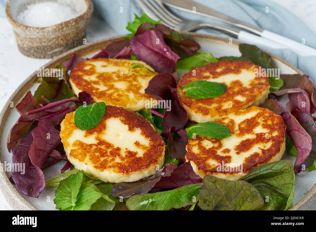 Cyprus roasted halloumi with salad mix, beet tops. Lchf, pegan, fodmap