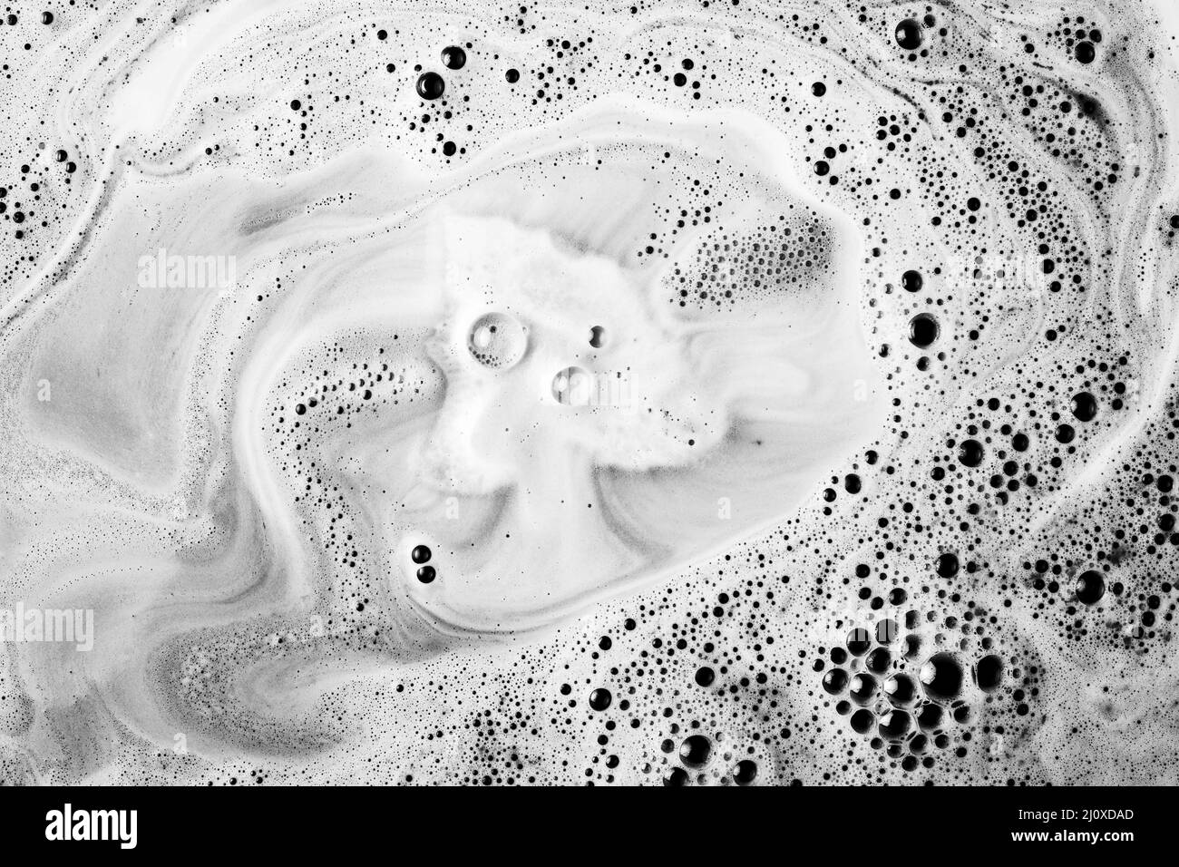 Dissolving bath bomb tub water with foam. High quality beautiful photo concept Stock Photo