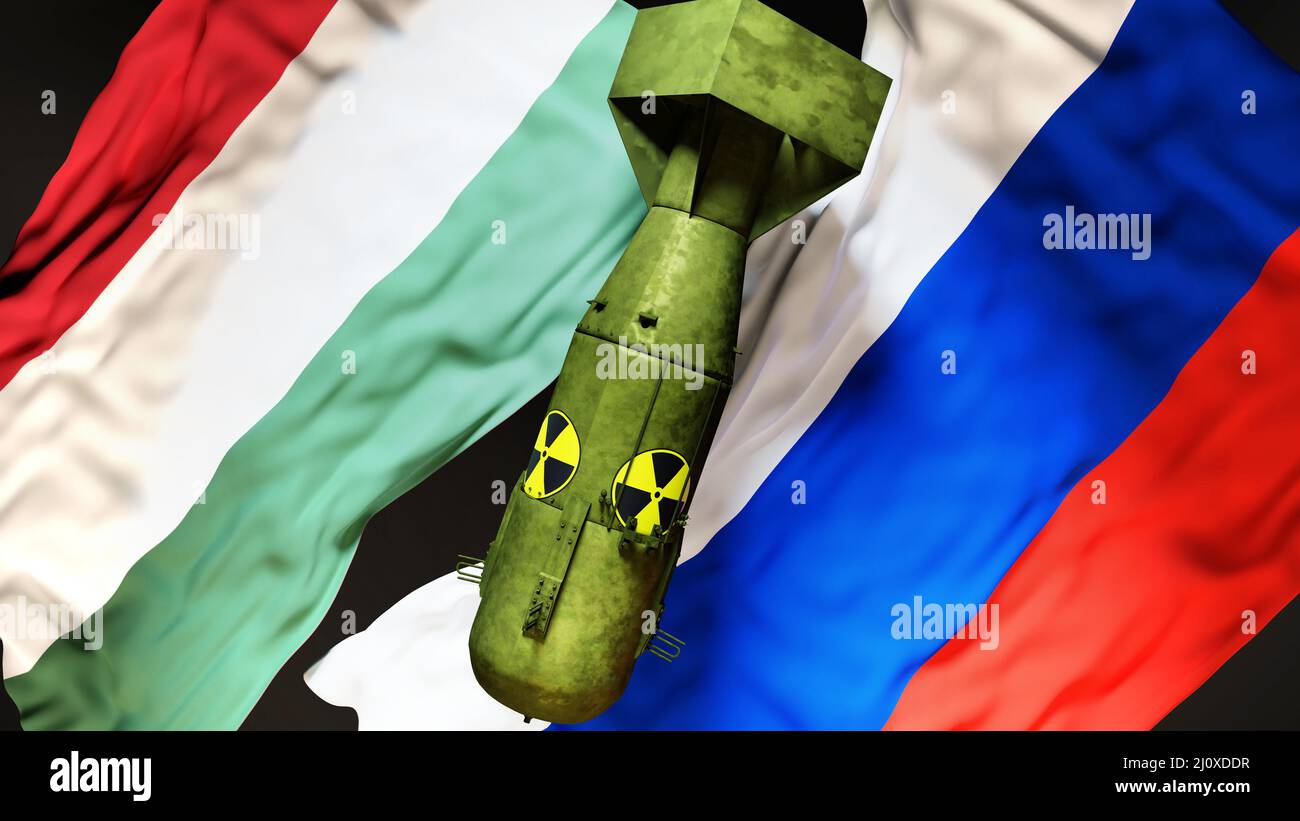 Hungary and Russia nuclear war, conflict and crisis. National flags and an atom bomb with radioactive logo to symbolize a nuclear threat and possible Stock Photo