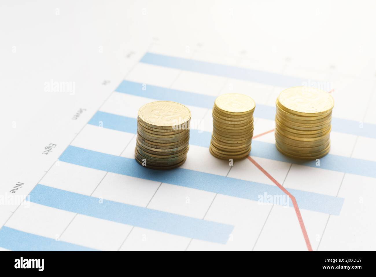 Piles coins top graph. High quality photo Stock Photo