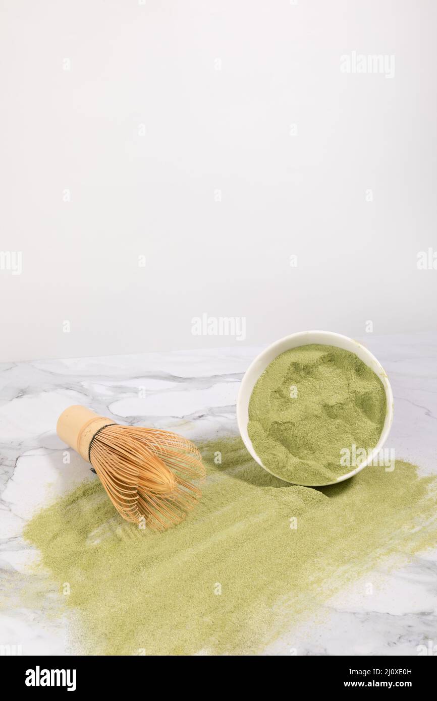 matcha green tea powder powder in a white bowl Stock Photo Alamy