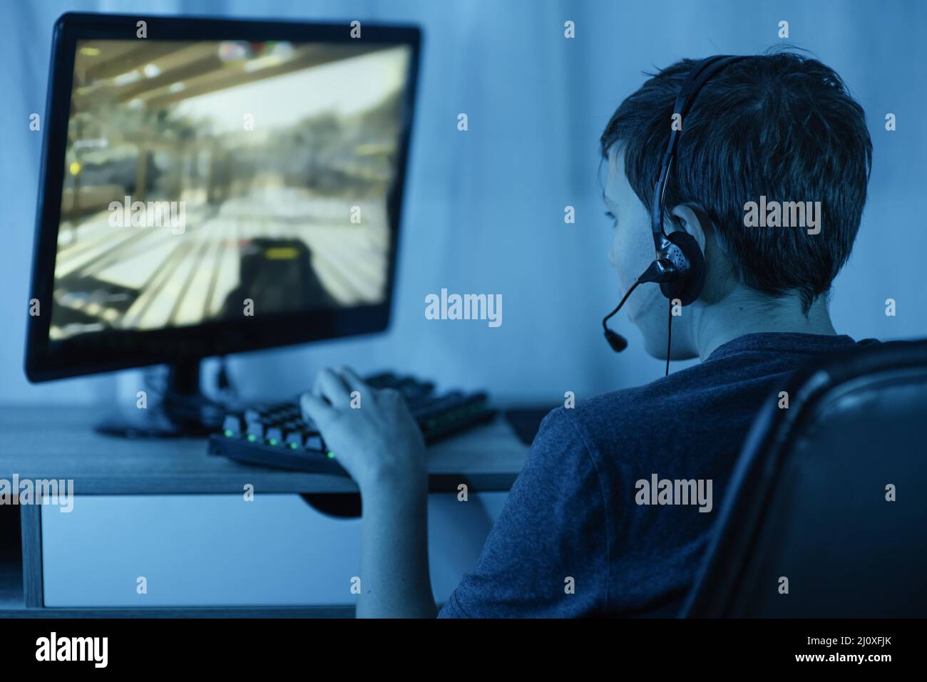 Young boy playing computer. High quality photo Stock Photo