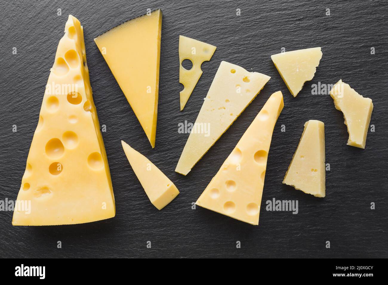 Flat lay assortent emmental cheese. High quality beautiful photo concept Stock Photo