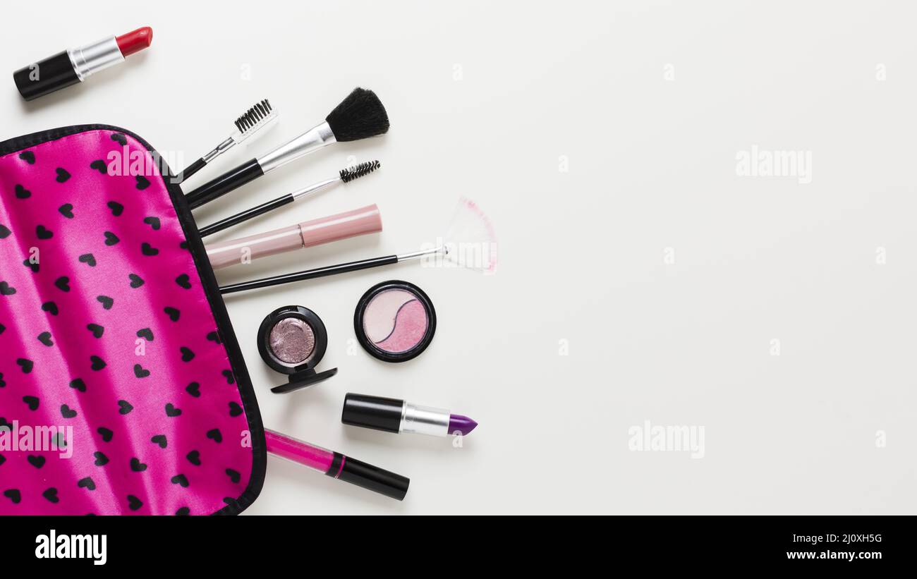 Pink makeup case with cosmetics brushes. High quality beautiful photo