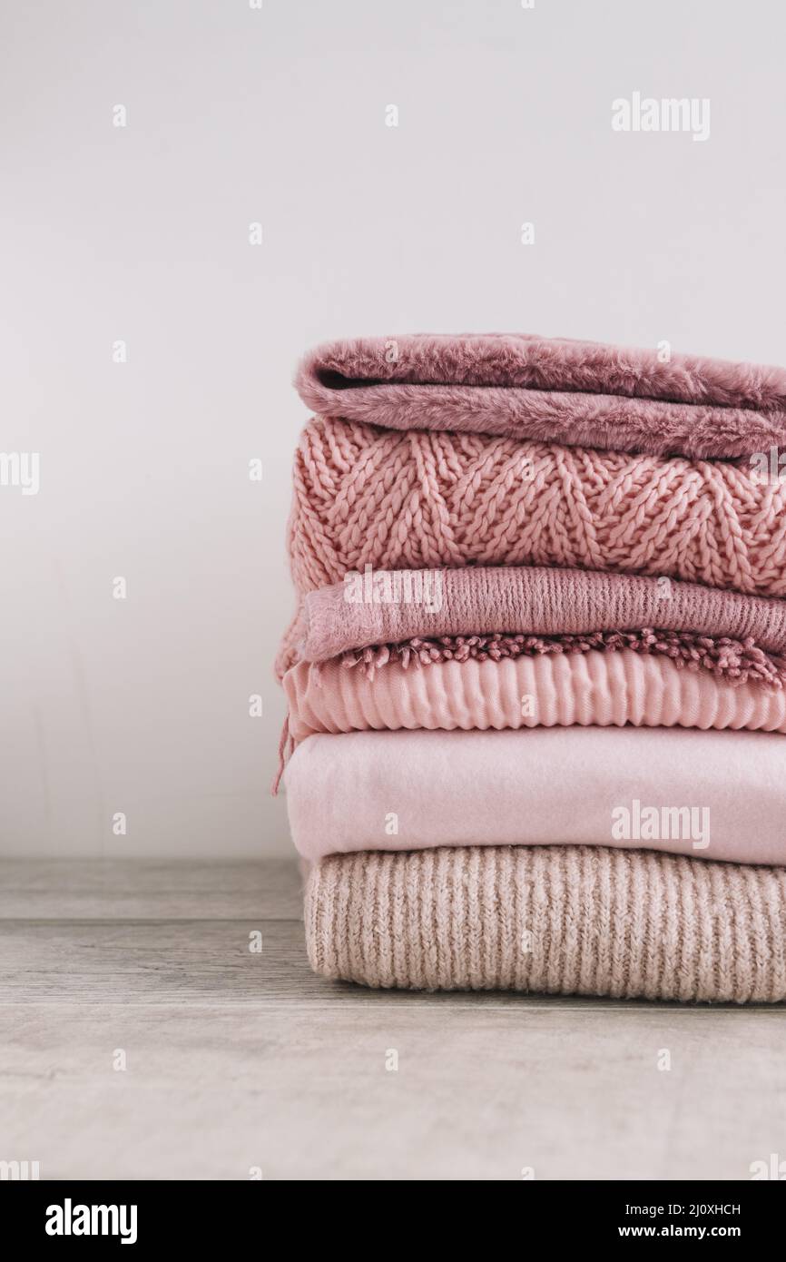 Stack knitted sweaters floor2. High quality beautiful photo concept Stock Photo