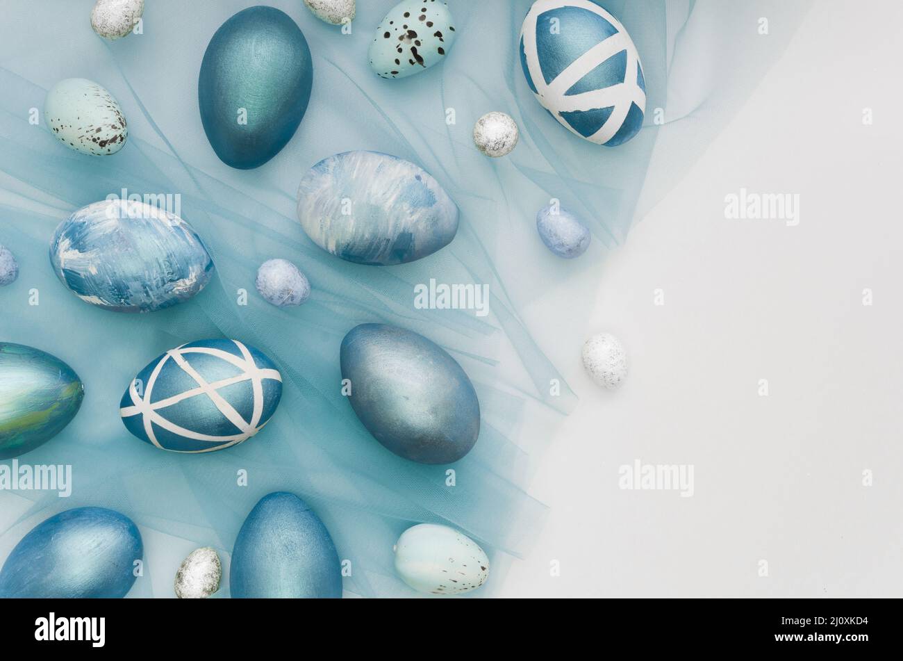 Flat lay painted easter eggs with copy space Stock Photo