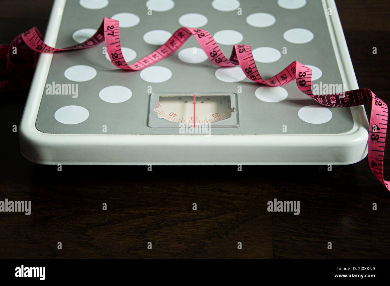 Straight view of weight scale and measuring tape. Weight loss and fitness concept. Stock Photo