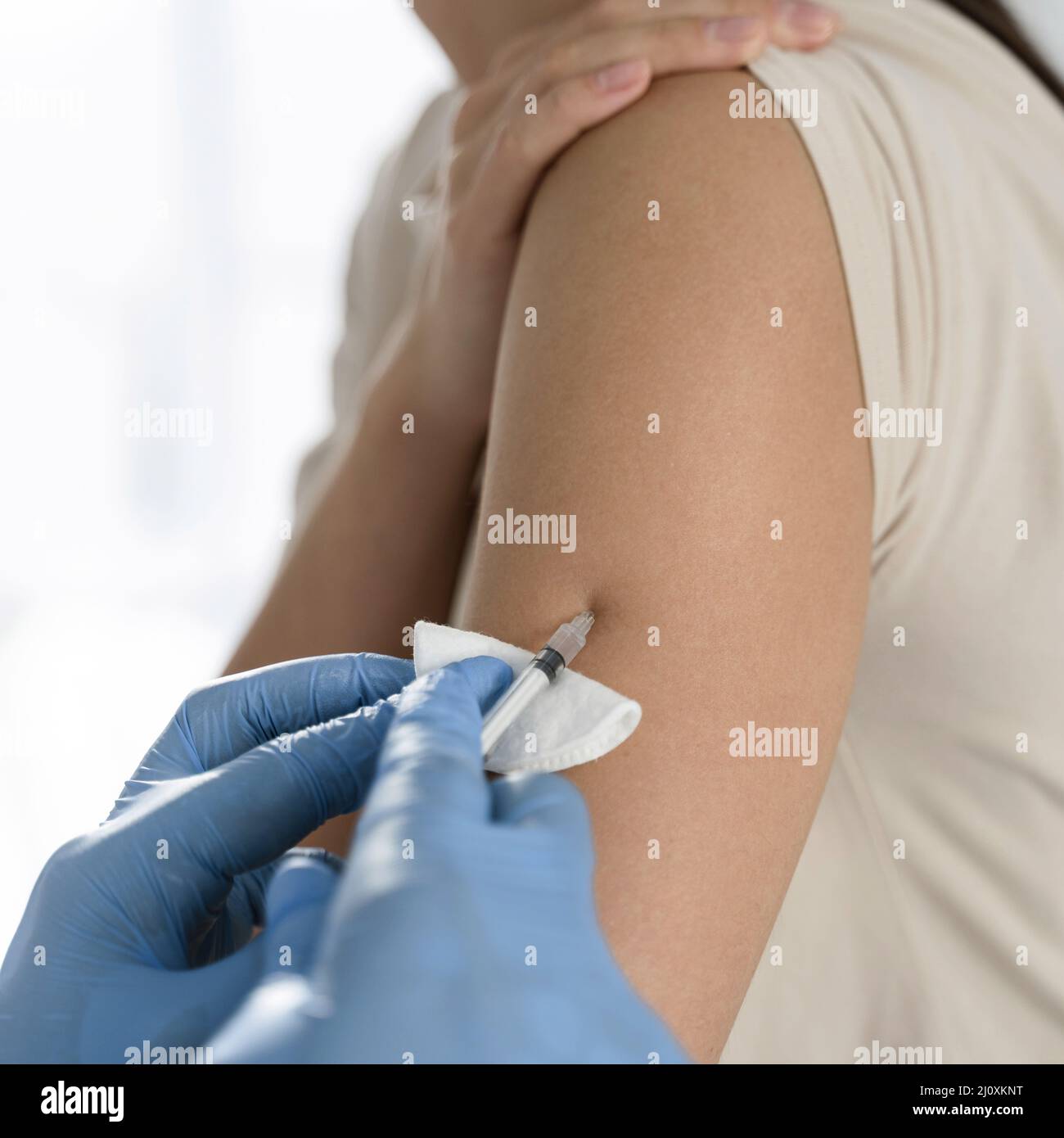 Coronavirus vaccine woman s arm. High quality beautiful photo concept Stock Photo