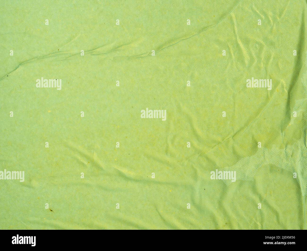 Green color crepe paper closeup. Stock Photo by ©pavelalexeev