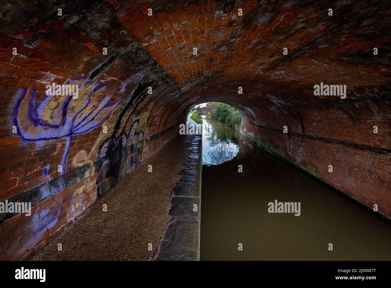 Grafitti on tunnel wall on canal in Bridgwater, Somerset, UK Stock Photo