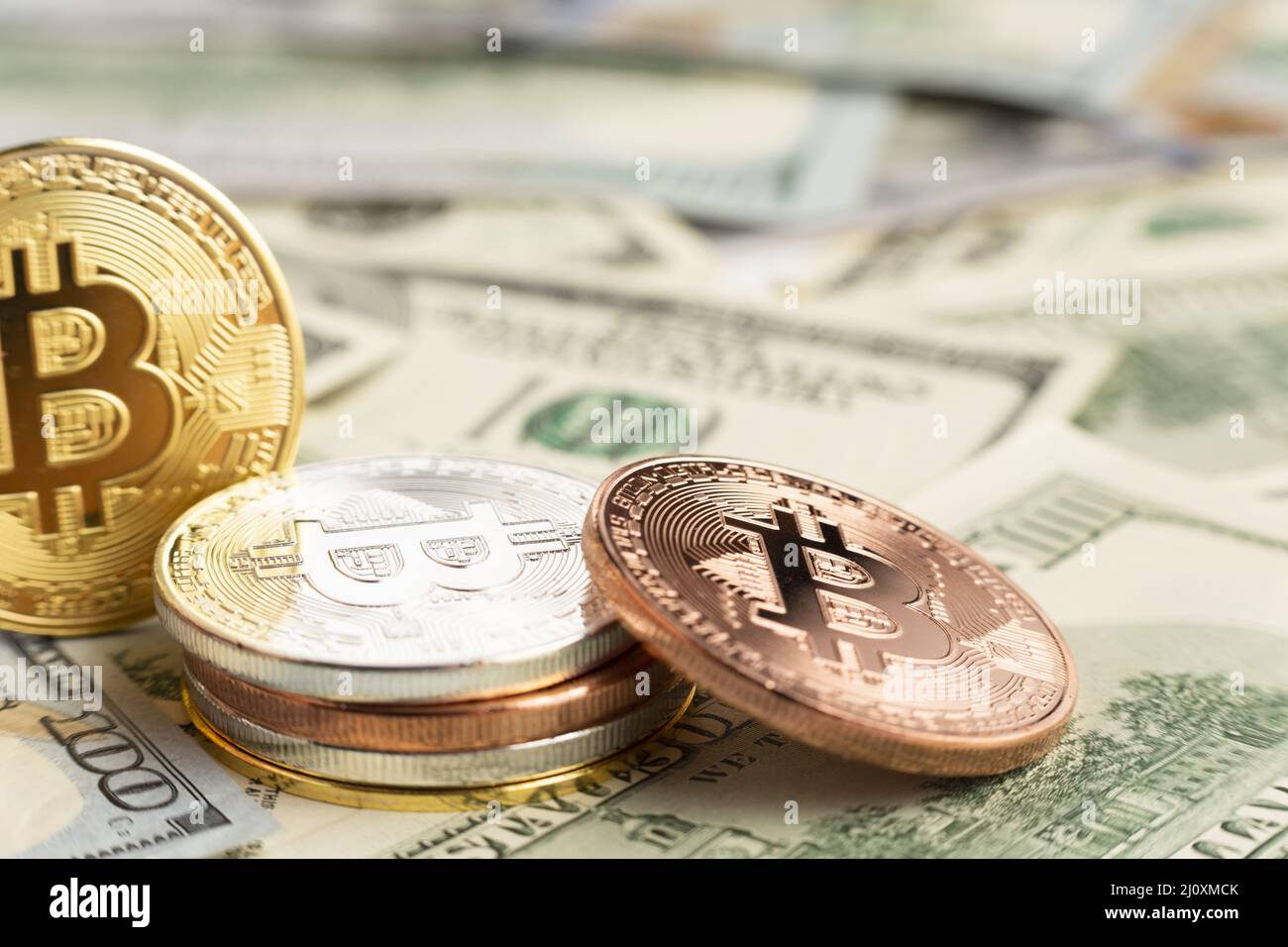 Bitcoin pile top dolar bills. High quality beautiful photo concept Stock Photo