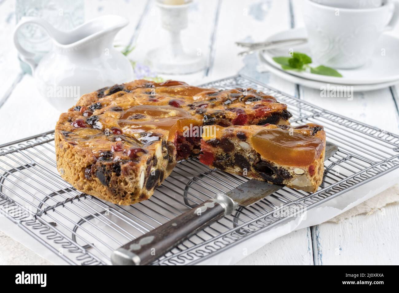 Traditional Australian Christmas cake with fruits and nuts served as close-up on a cake plate Stock Photo