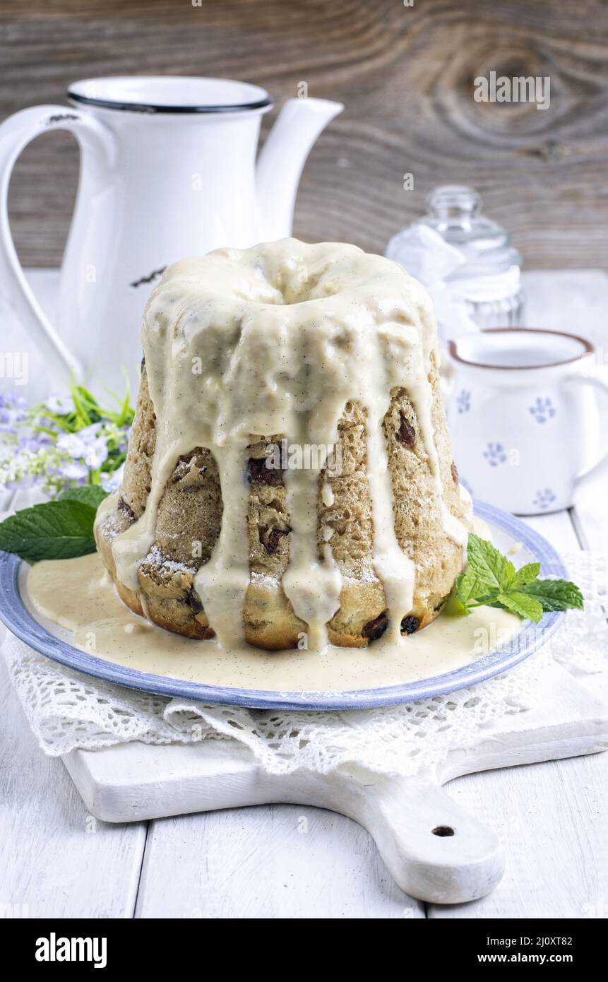Bundt cake with vanilla sauce Stock Photo