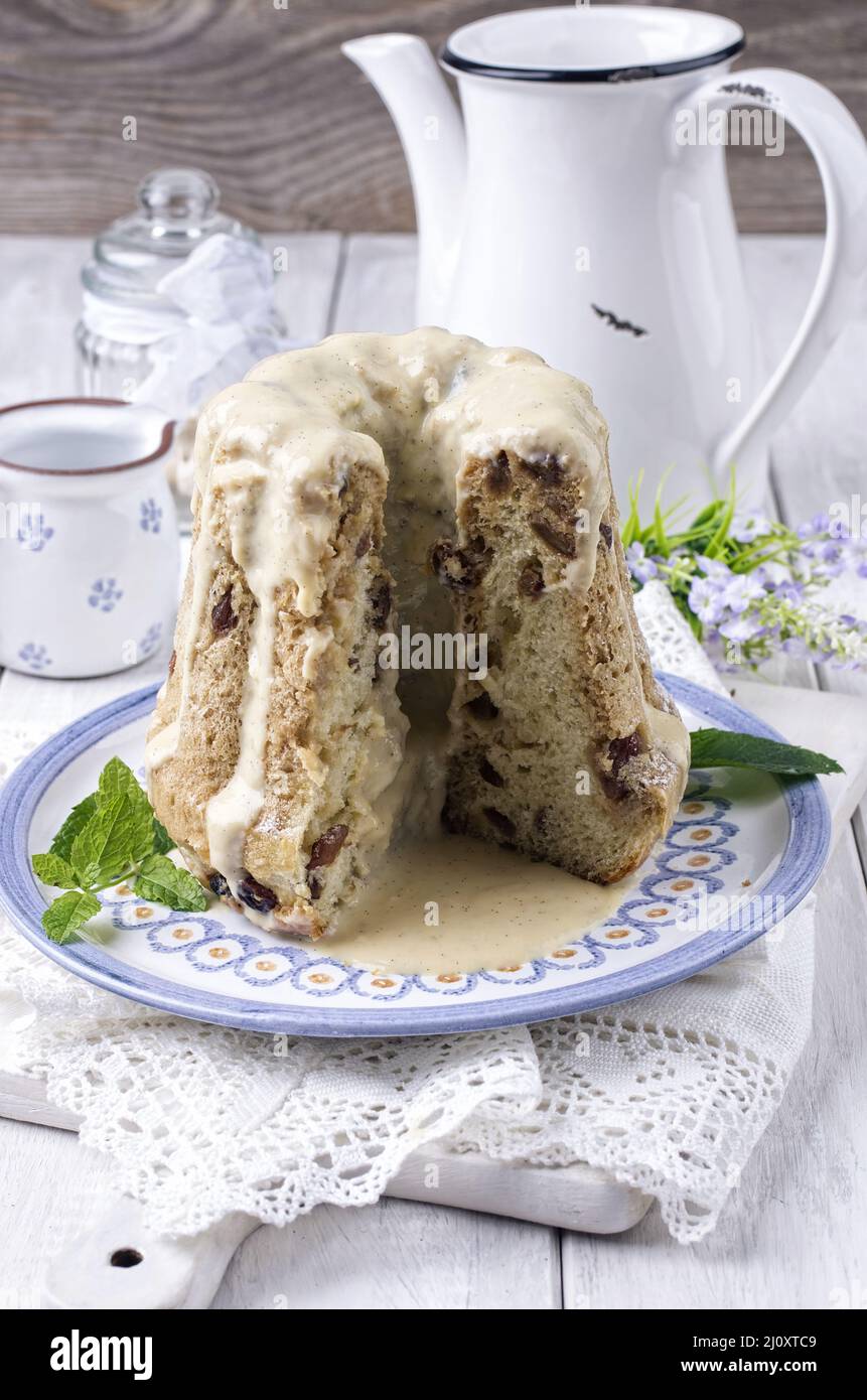 Cake gugelhupf with vanilla sauce Stock Photo