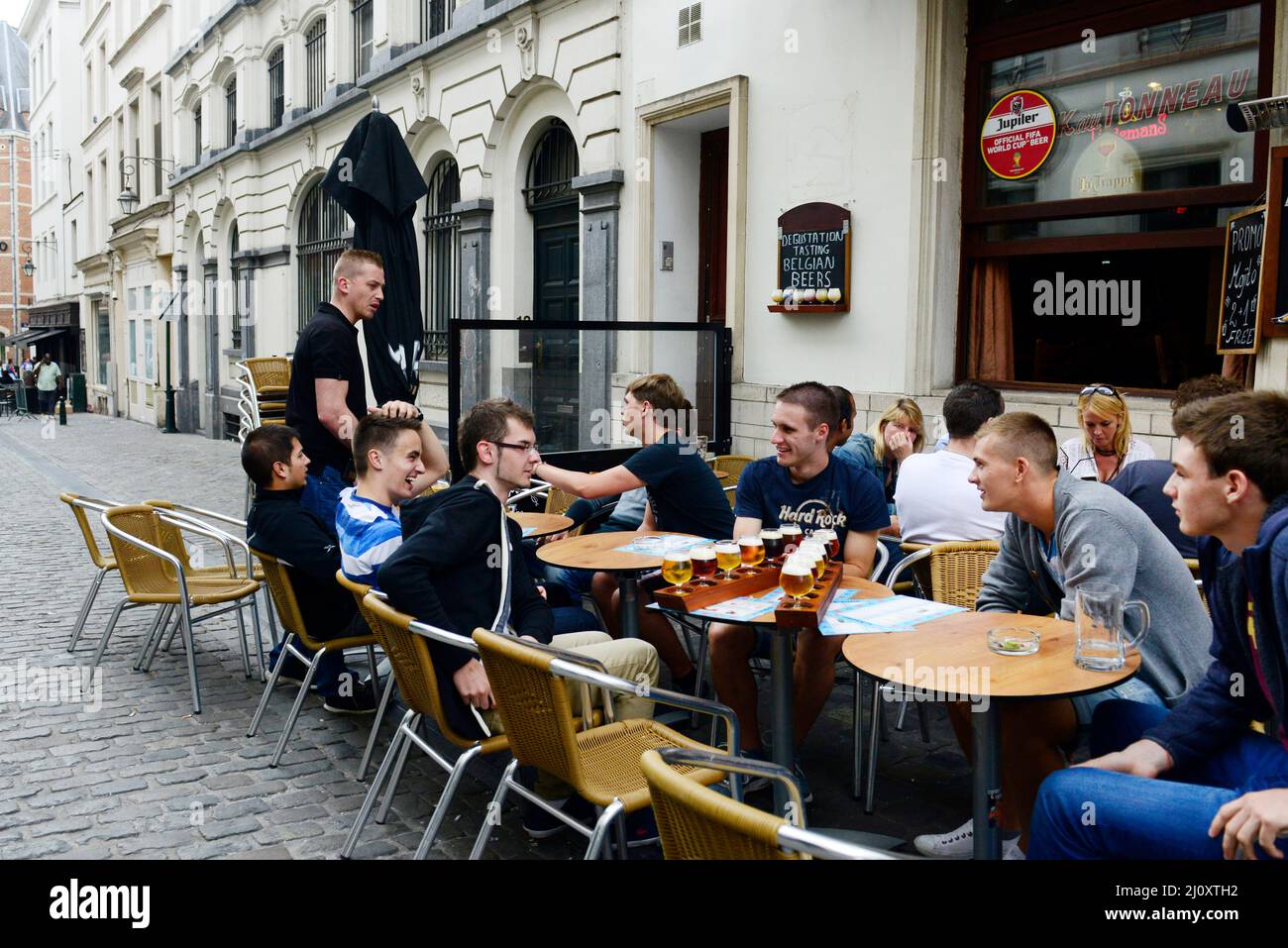 Beer tasting in one of the vibrant bars in the historical center of Brussels Stock Photo Alamy
