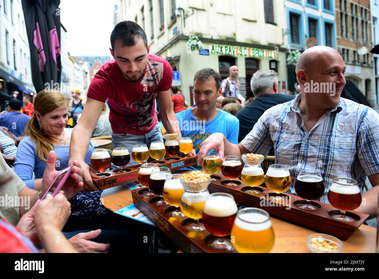 Beer tasting in one of the vibrant bars in the historical center of Brussels Stock Photo Alamy