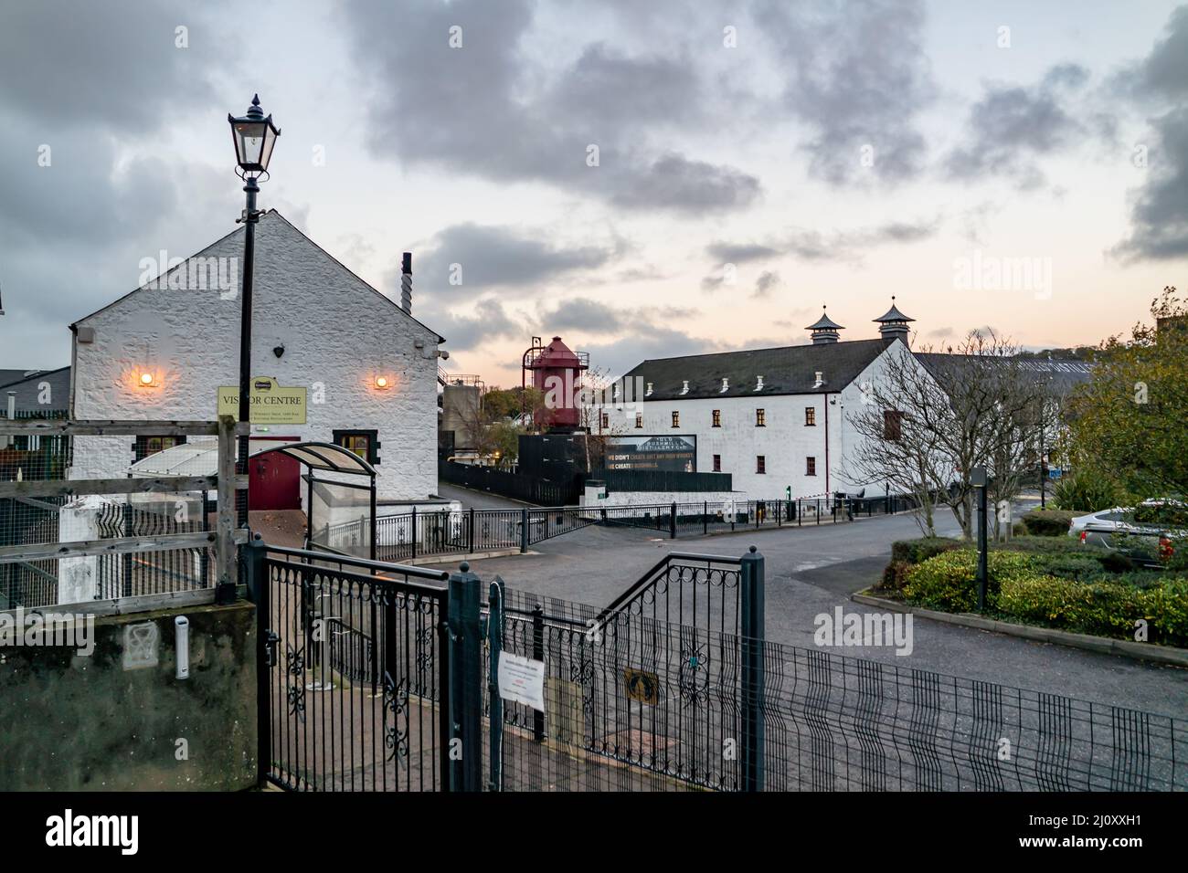 BUSHMILLS, NORTHERN IRELAND - NOVEMBER 24 2021 : The Bushmills distillery is producing but closed during the Covid 19 pandemic. Stock Photo