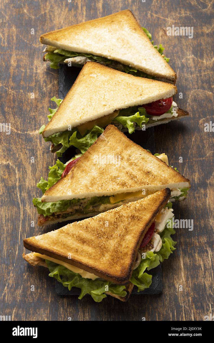 High angle triangle sandwiches with tomatoes. High quality photo Stock