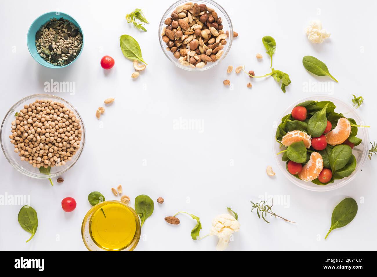 Top view healthy ingredients bowls white background with blank space text. High quality photo Stock Photo