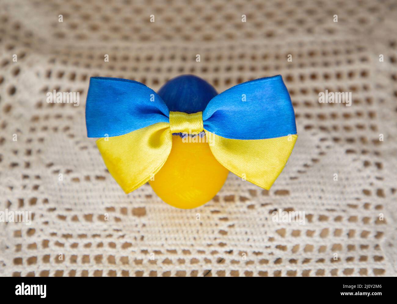 chicken Easter egg painted in yellow and blue colors of the Ukrainian ...