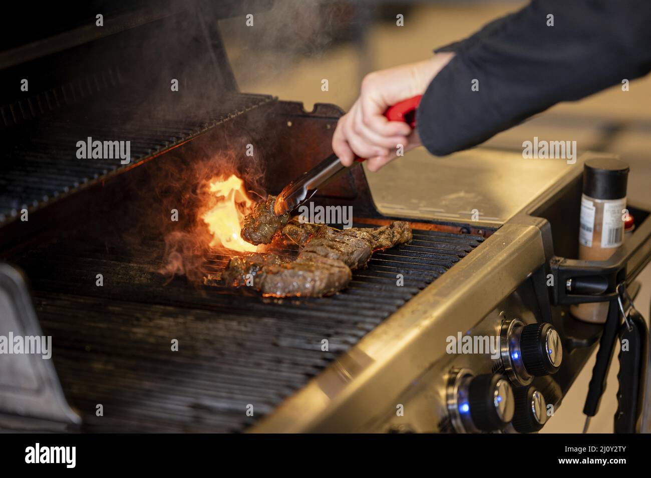 Hand making barbeque Stock Photo Alamy