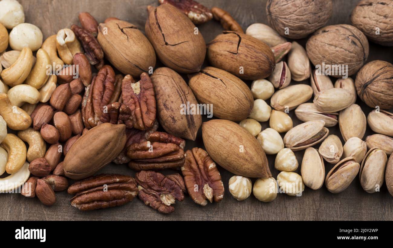 Top view various organic nuts snack background. High quality photo ...