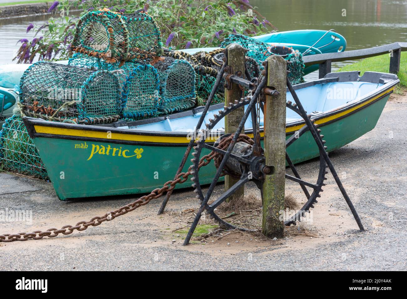 BUDE, CORNWALL, UK - AUGUST 15 : Rowing boat and lobster pots in Bude in Cornwall on August 15, 2013 Stock Photo