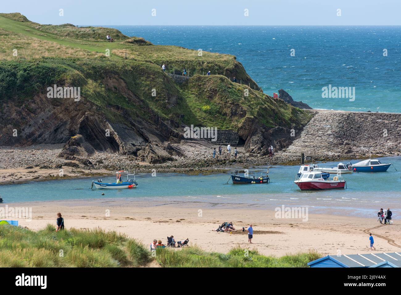BUDE, CORNWALL, UK - AUGUST 15 :  Beach and harbour in Bude in Cornwall on August 15, 2013. Unidentified people Stock Photo