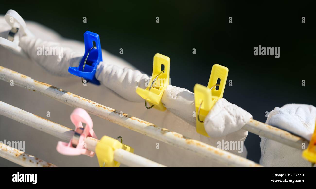 Clothespins and clothes drying outside the window Stock Photo Alamy