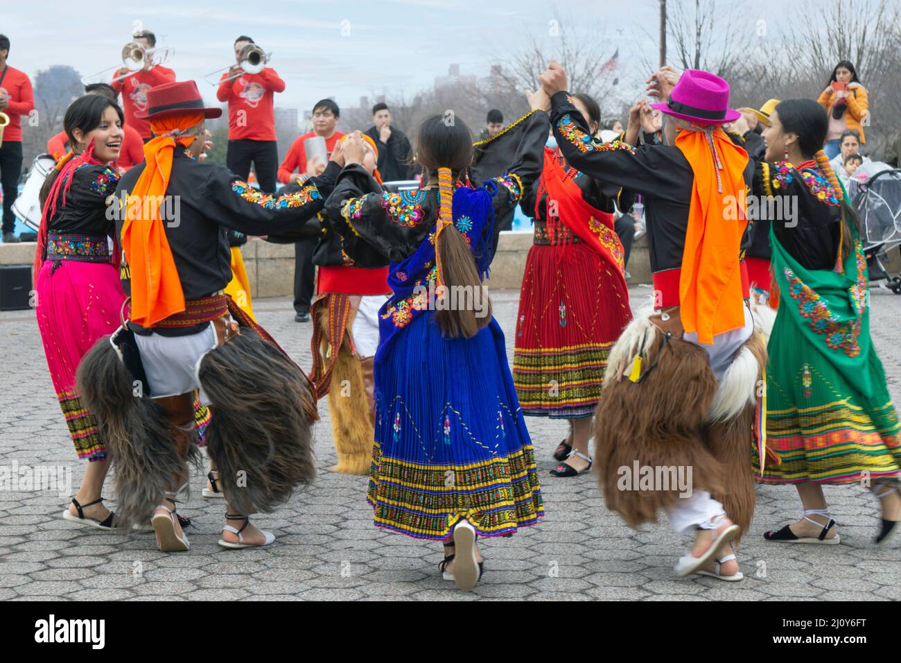Dancers from Jatary Muzhucuna, an Ecuadorian American music & dance troupe, perform in a park in Queens, New York City. Stock Photo