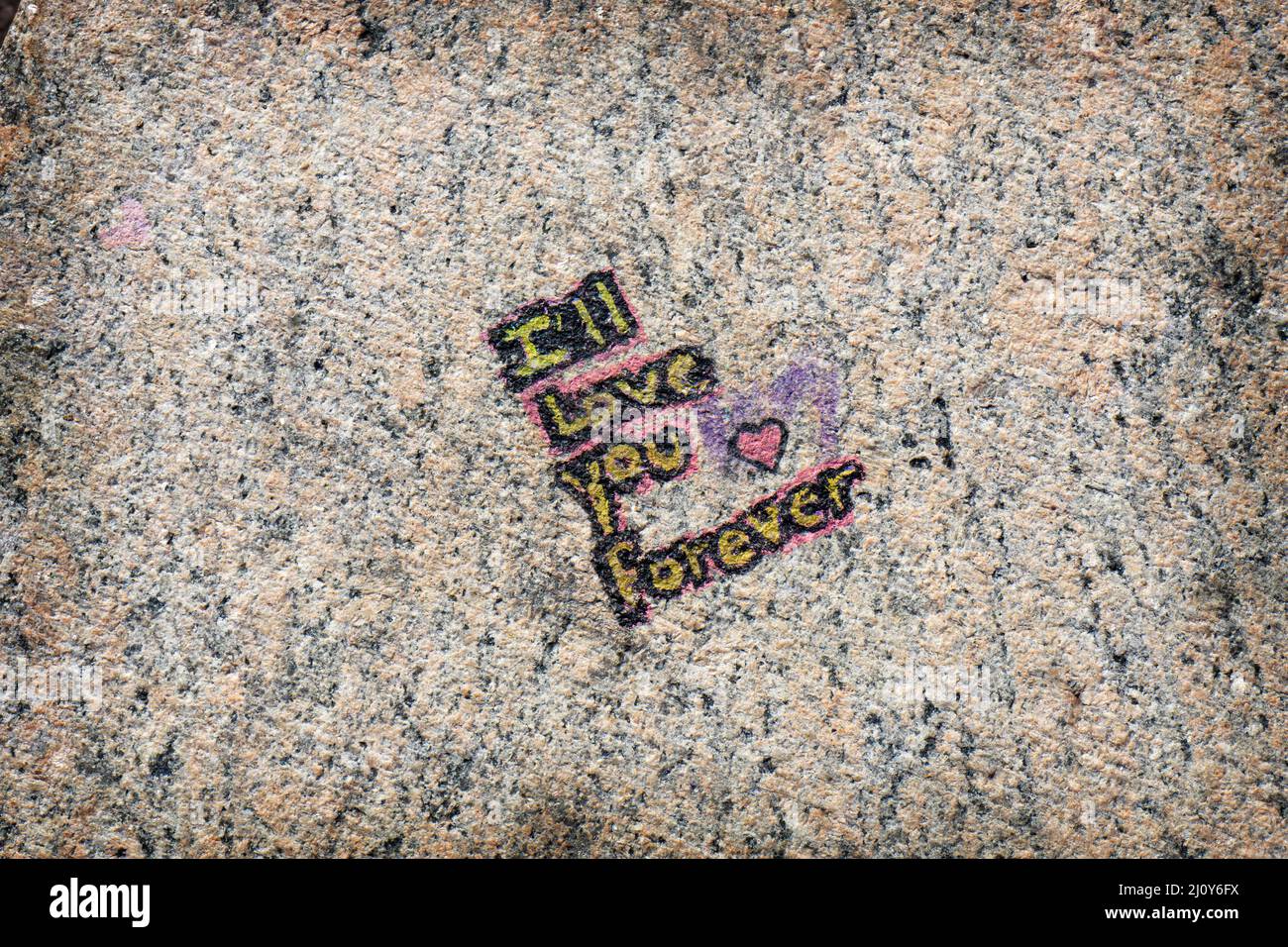 A small chalk painting on the wall around the Unisphere proclaiming 'I'll Love you forever.' In Flushing Meadows Park in Queens, New York. Stock Photo
