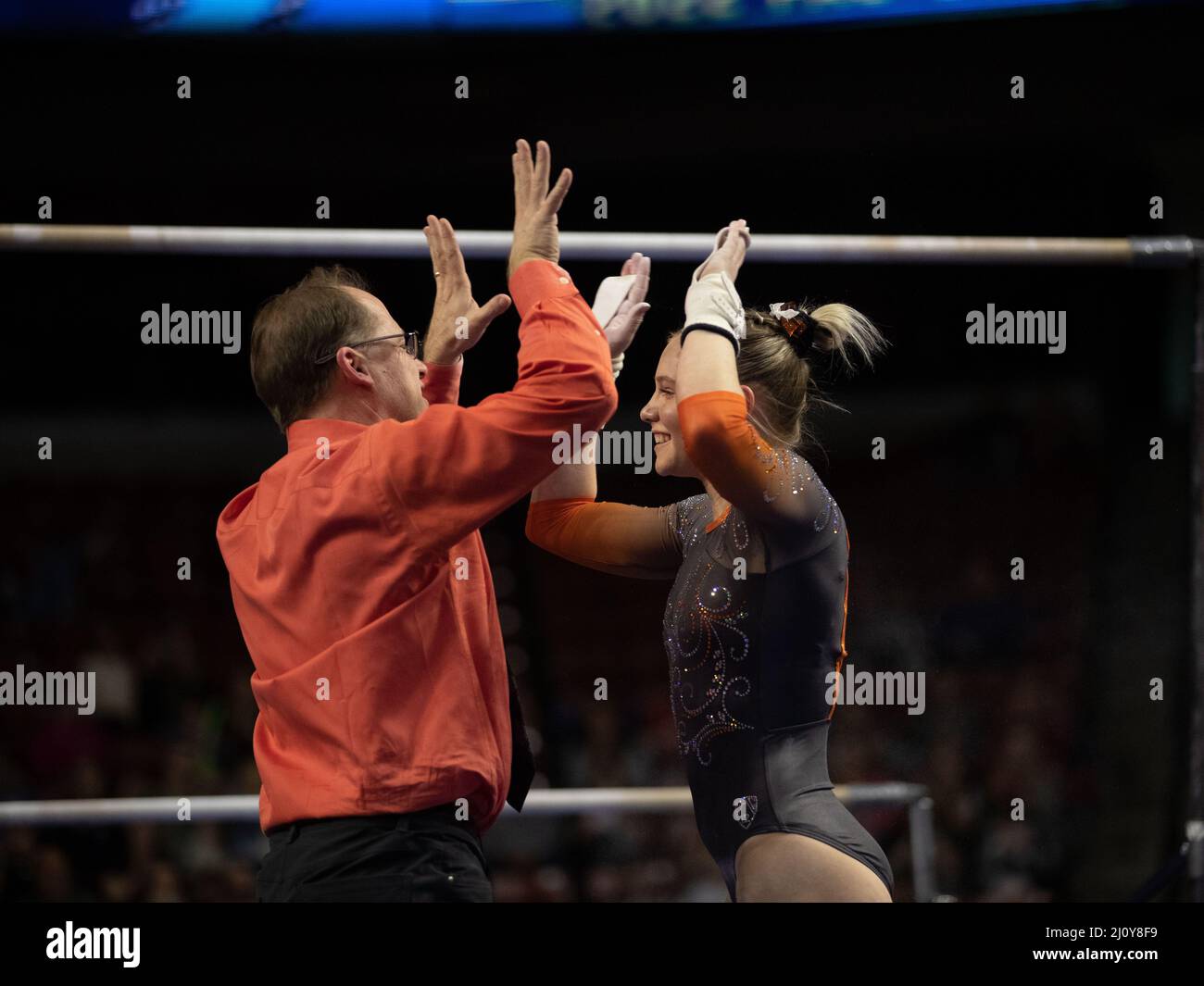 March 19, 2022: Oregon State University gymnast and Olympic gold medalist Jade Carey and her coach Michael Chaplin celebrate during the 2022 Pac-12 Women's Gymnastics championships. Melissa J. Perenson/CSM Stock Photo