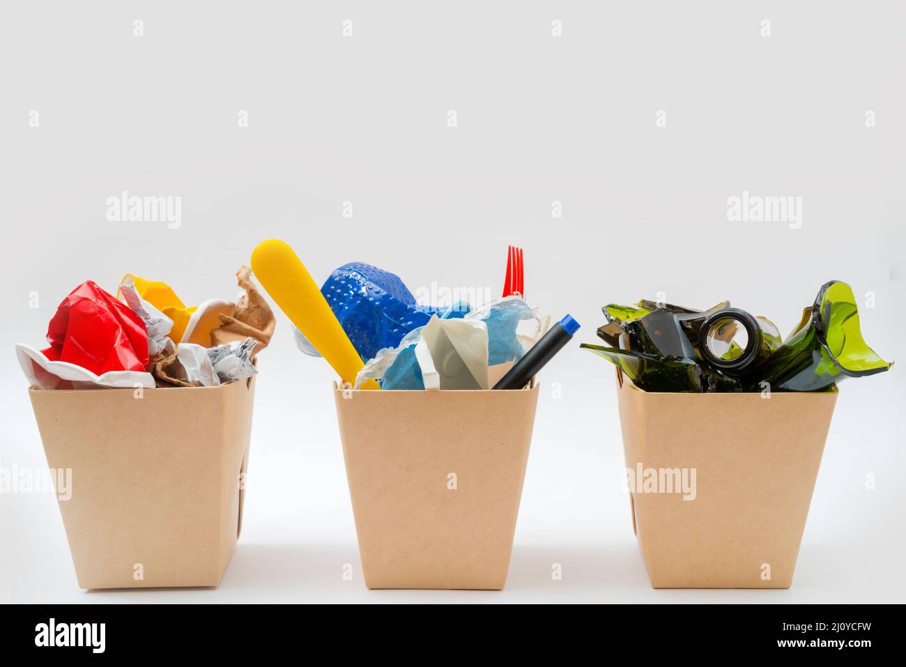 Separate garbage collection. Paper, Plastic, Glass. Environmental pollution. Stock Photo