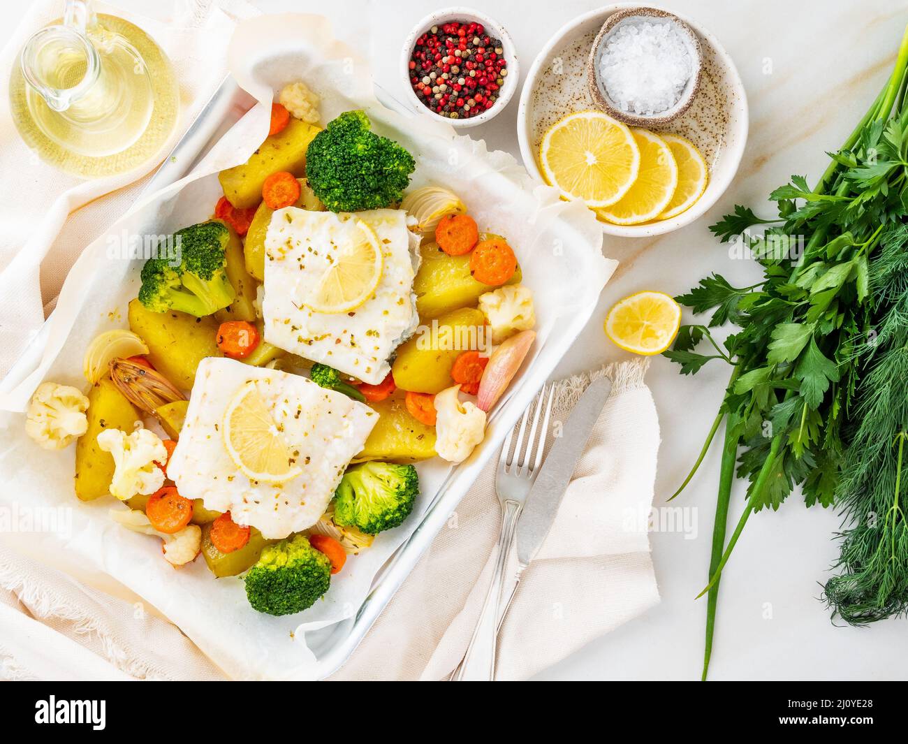 Fish cod baked in the oven with vegetables healthy diet healthy food. Light Stock Photo Alamy