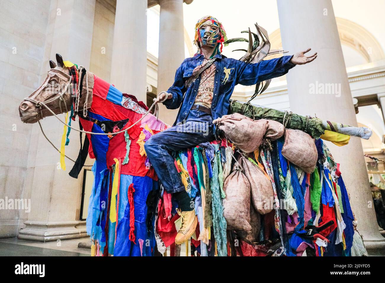 London, UK, 21st March 2022. Detail, 'The Procession', which is one large installation with many different elements. Influence of both Indian and Indo-Caribbean culture, including many carnival elements, can be seen. According to Locke, 'The Procession' is not a historic textbook, but rather an 'extended poem of contrasting references and imagery. The annual Tate Britain Commission has been undertaken by Guyanese-British artist Hew Locke with 'The Procession'. Credit: Imageplotter/Alamy Live News Stock Photo