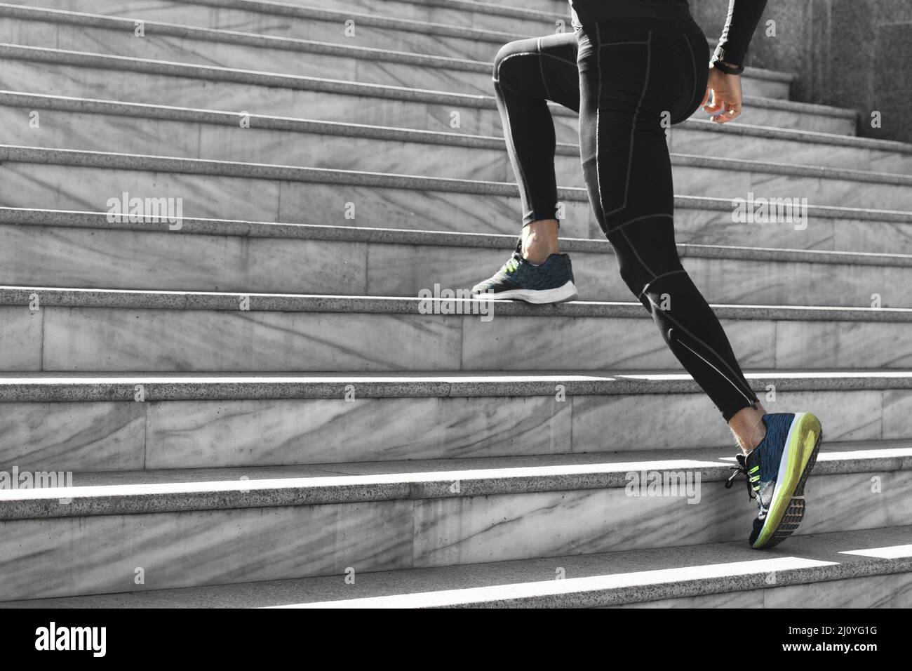 https://c8.alamy.com/comp/2J0YG1G/side-view-man-athletic-wear-exercising-stairs-outdoors-high-quality-photo-2J0YG1G.jpg