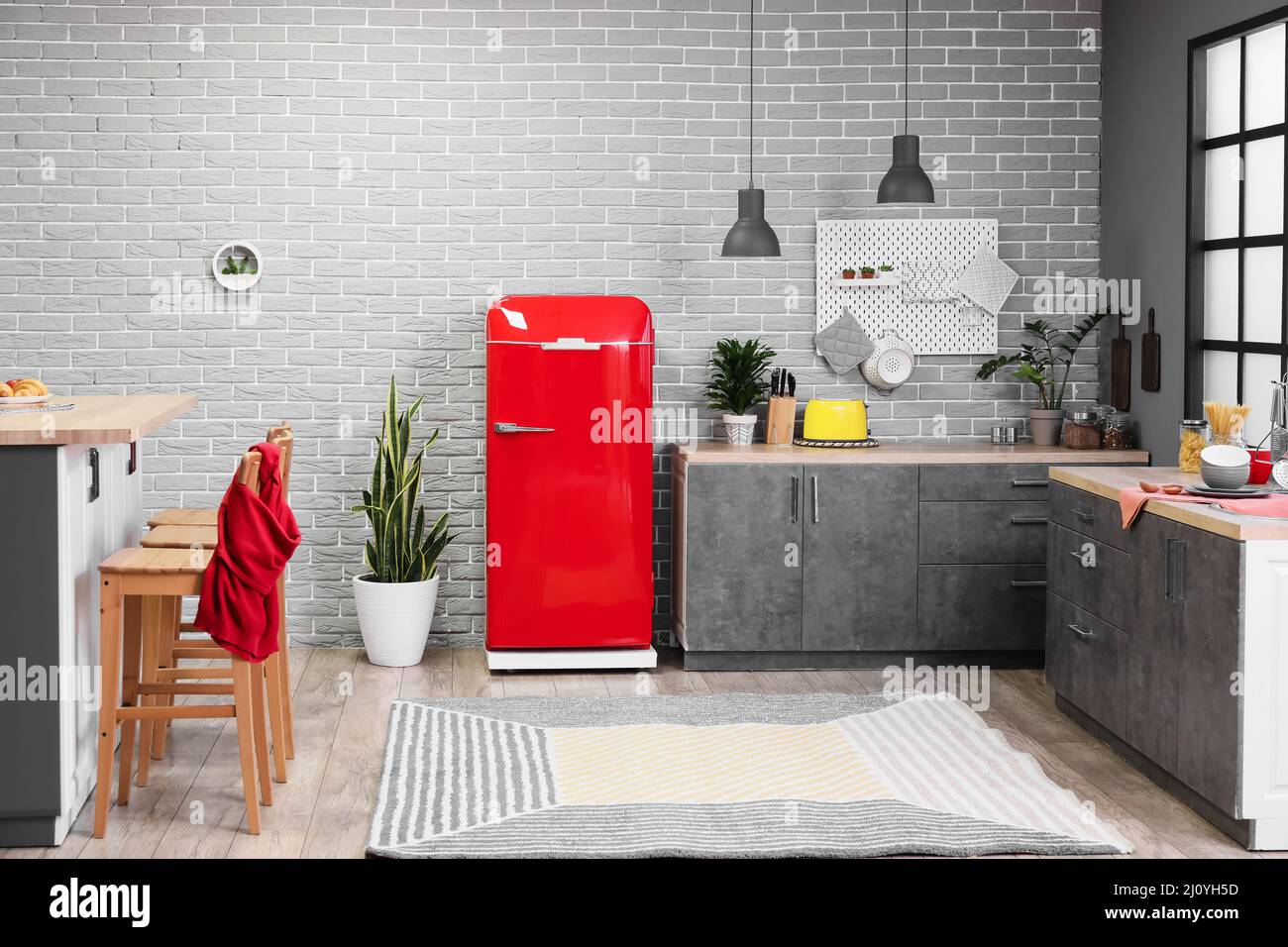 Interior of modern kitchen with stylish refrigerator and counters Stock ...