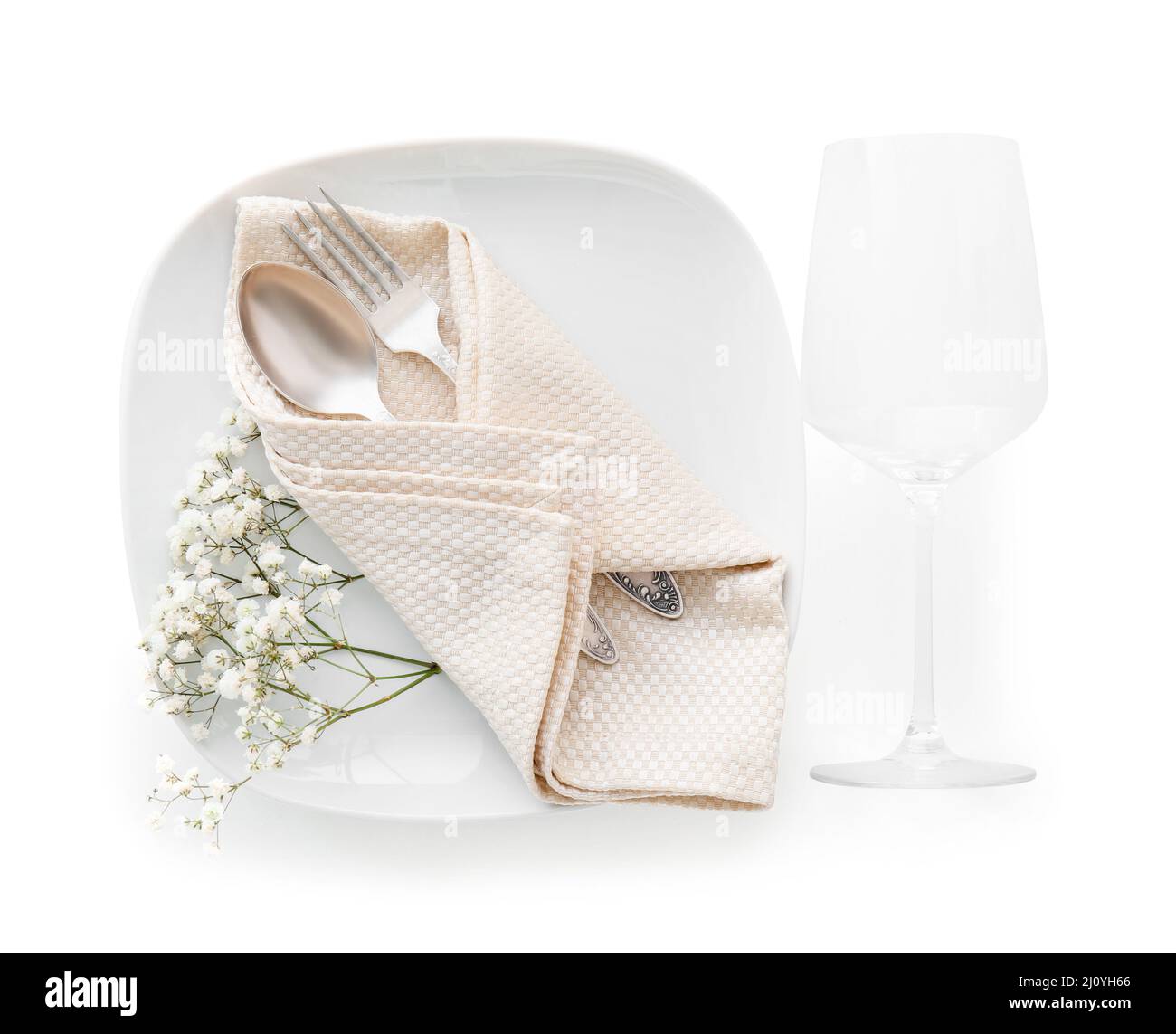 Elegant table setting with flowers on white background Stock Photo - Alamy