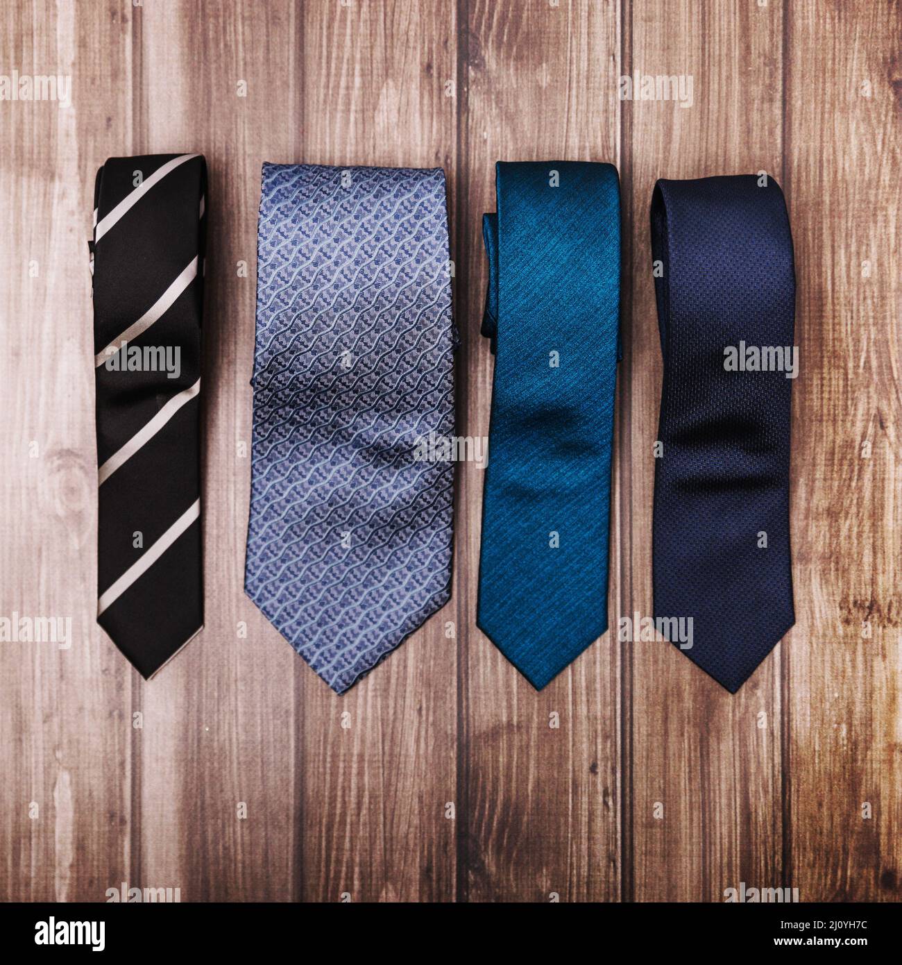 Stylish ties wooden table. High quality photo Stock Photo