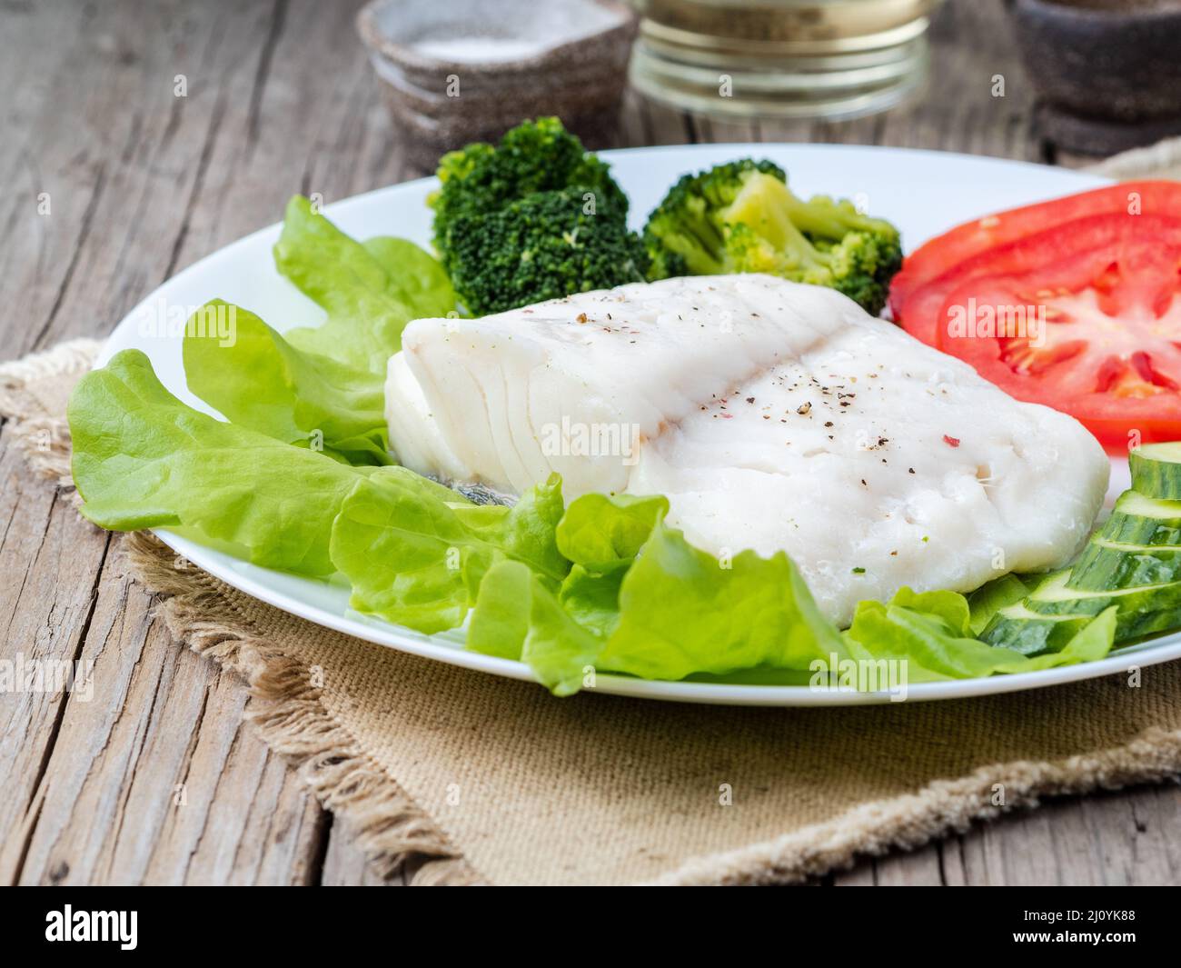 Steamed cod fish. Paleo, keto, fodmap healthy diet with Stock Photo