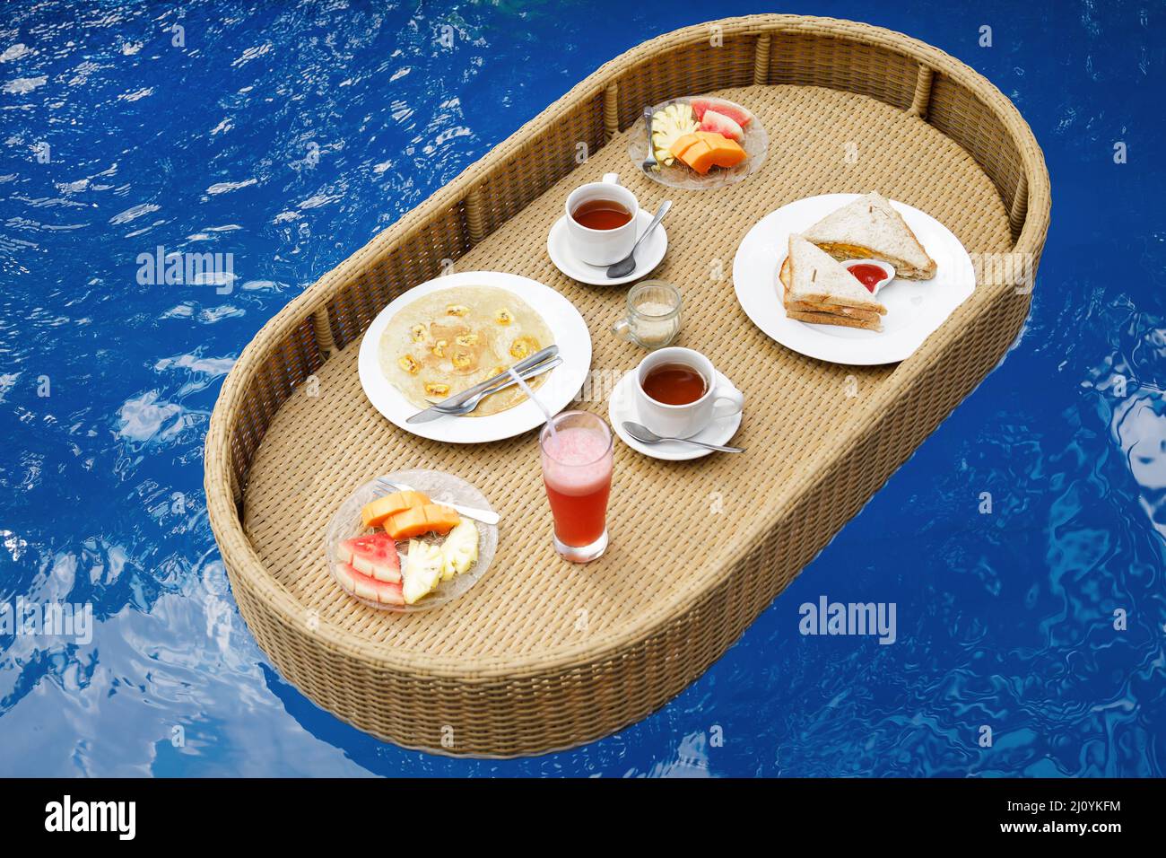 Delicious floating breakfast in the swimming pool Stock Photo - Alamy