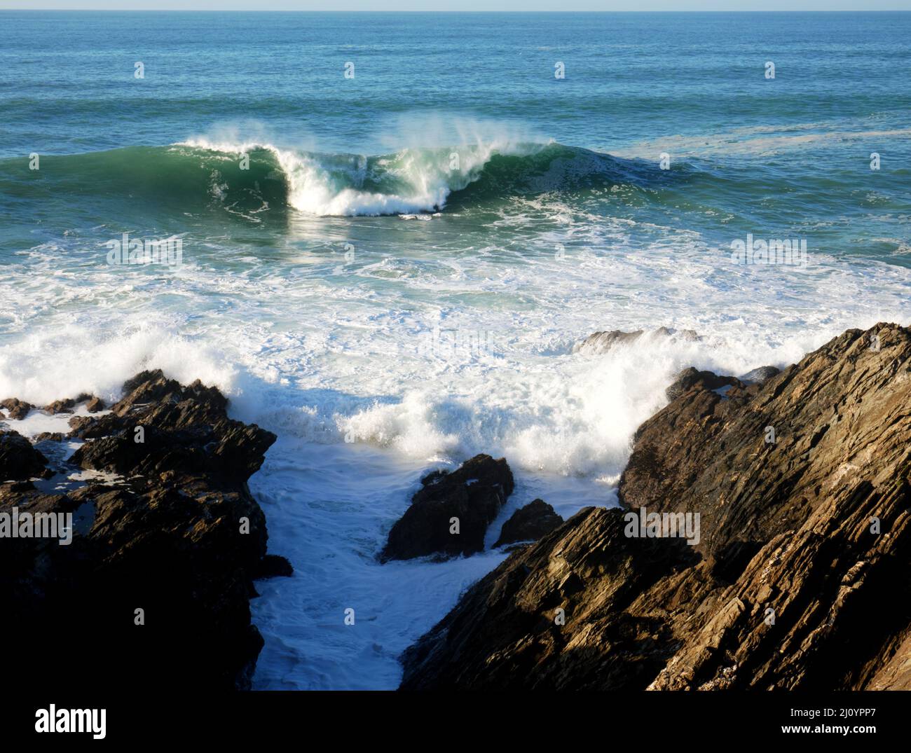 Breaking waves off Towan Head, Newquay, Cornwall. Stock Photo