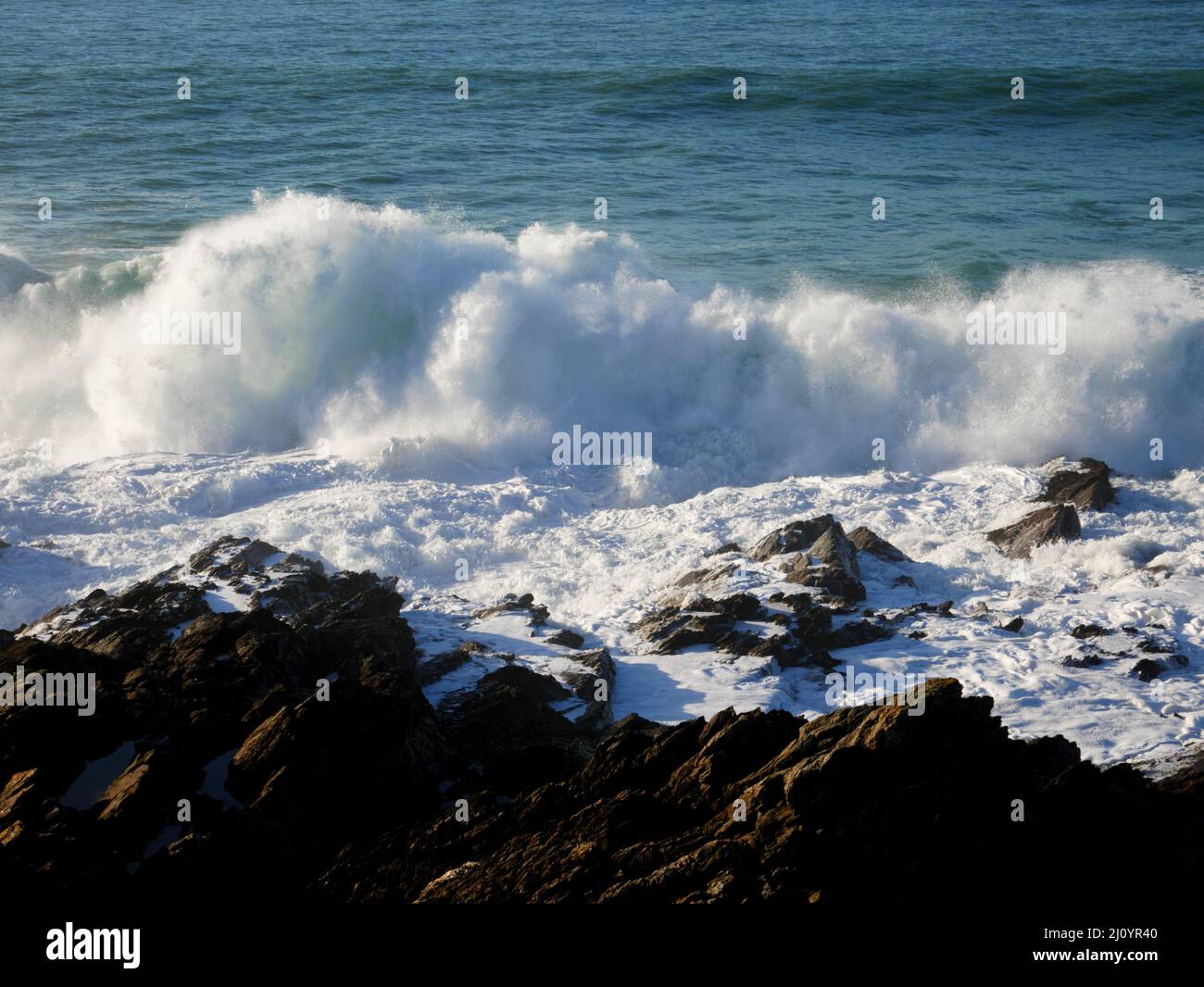 Breaking waves off Towan Head, Newquay, Cornwall. Stock Photo