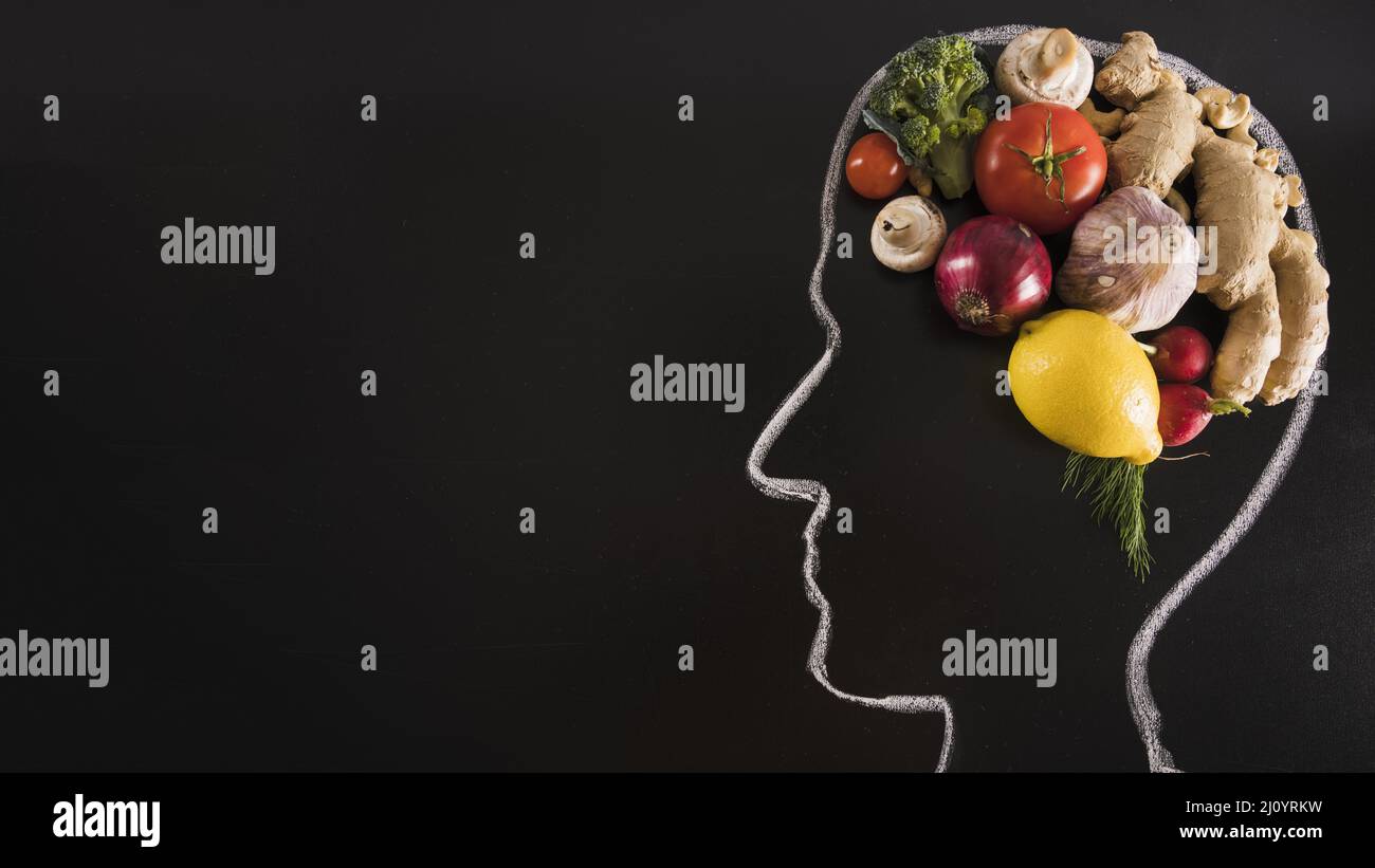 Chalk drawn human head with healthy food brain blackboard. High quality photo Stock Photo