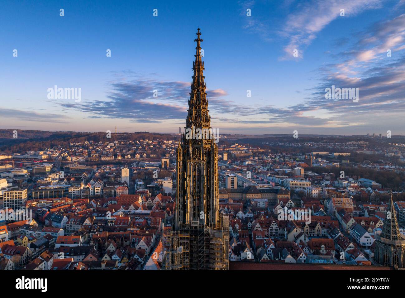 Aerial shot taken with a drone of Ulm Minster at sunrise, in Germany Stock Photo