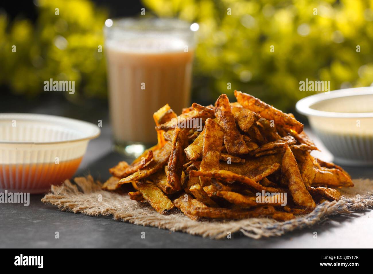 Crispy Fried Potato Chips with hot tea and sauce Stock Photo Alamy