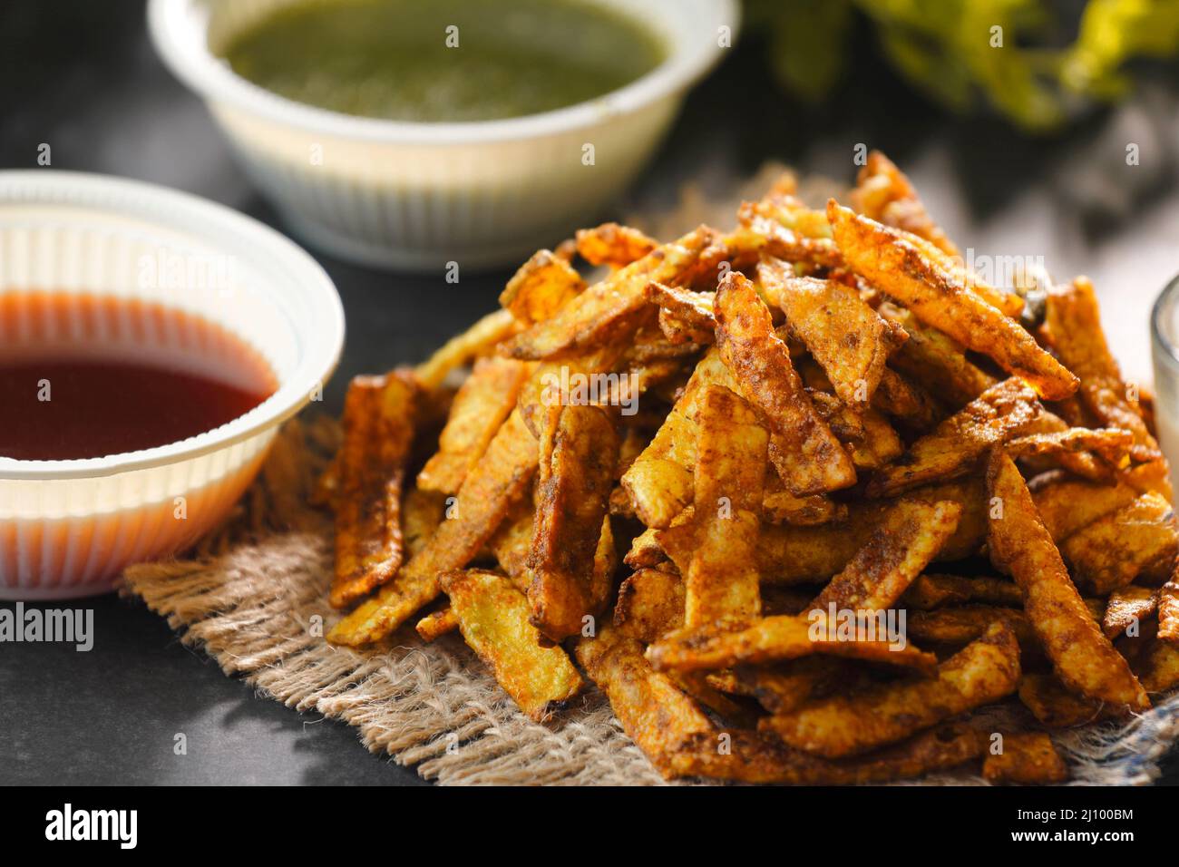 Crispy Fried Greasy Potato Chips with sauce Stock Photo Alamy
